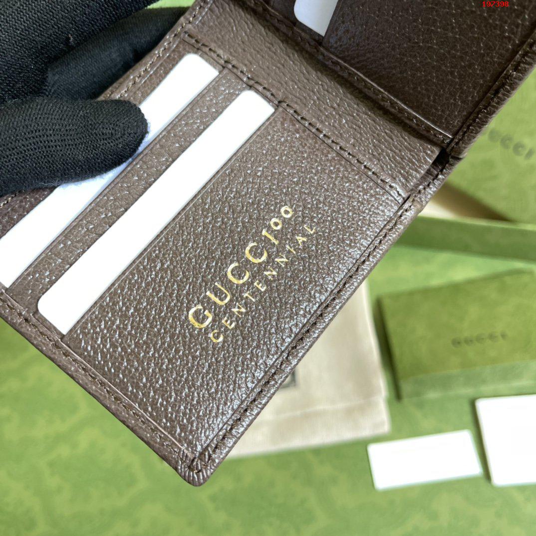 全セットの元工場の緑箱を添えて包装この簡潔で繊長な財布はGG 100周年特別シリーズを採用して同色調の革のエッジと相互ボタン式双