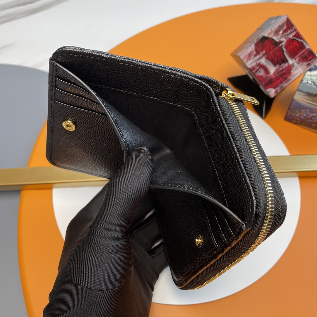 オリジナルSLP短い円状ファスナー財布に黒粒子テクスチャ牛革を採用中央ゴールド調金属連結YSLマーク側面に6つのカードビット1コ