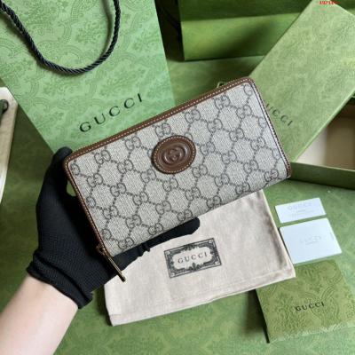 全セットの元工場緑箱包装この簡潔で繊長な財布は茶色GG Supreme帆布材質で装飾して同色調の皮革転辺と相互ボタン式双G標識で